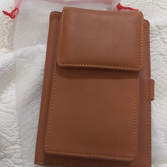 STG hand purse with shoulder strap and slip to put phone. Never used - Picture 2 of 12